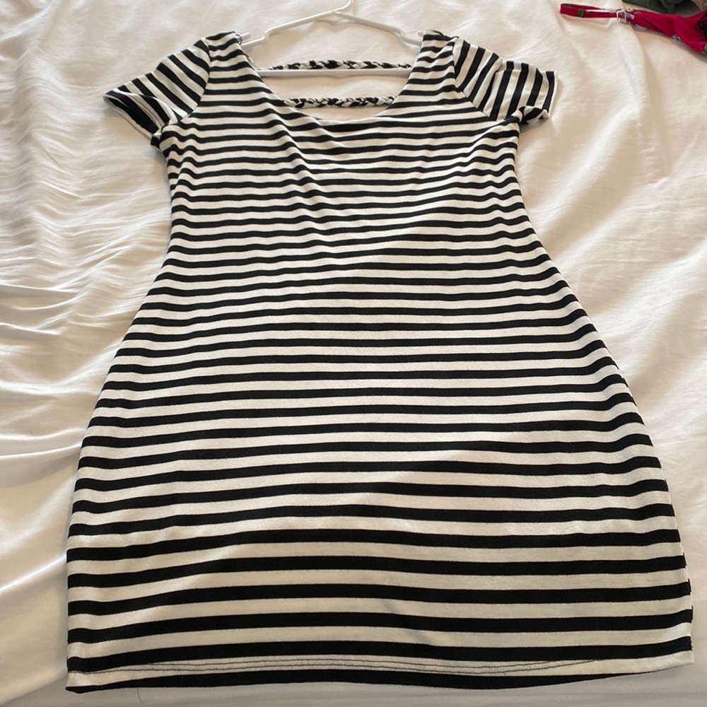 Soprano: Black and white stripped dress. Love the braided back